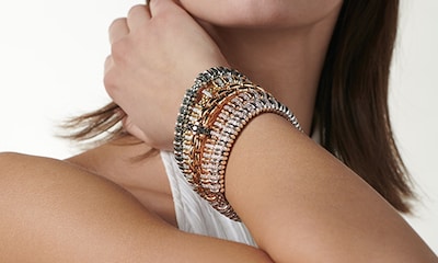 Shop Fope Vendome Collection. Image of model wearing Vendome bracelet stack image