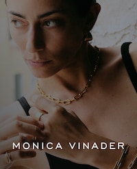 Image of monica vinader model wearing mixed jewellery - tap to shop monica vinader jewellery image