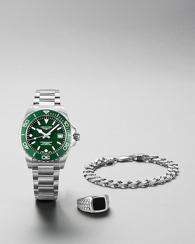 Image of Longines watch with green dial and mens jewellery. Tap to shop all fathers day gifts image