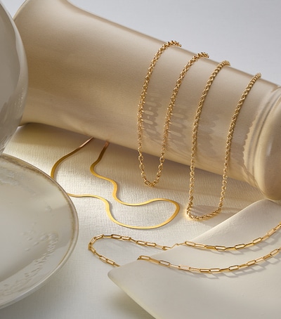 Image of yellow gold jewellery cream ceramic dish. tap to shop all yellow gold jewellery image