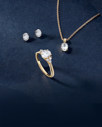 Image of Mappin & Webb Traceable Diamond necklaces on blue velvet background. Tap to shop the collection. image