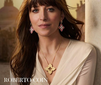 Dakota Johnson wearing Roberto Coin jewellery in Venice campaign imagery image