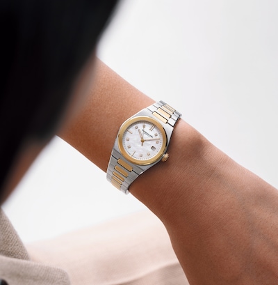 Image of ladies' hand wearing Raymond Weild bi-colour dial watch image