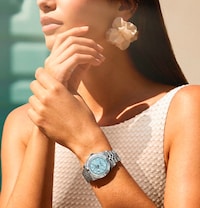 Female model wearing Tudor watch - tap to shop all ladies tudor watches image