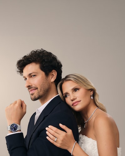 Image of man and woman wearing mappin and webb wedding jewellery. Celebrate your wedding day with jewellery crafted to honour every cherished moment. Explore wedding rings image